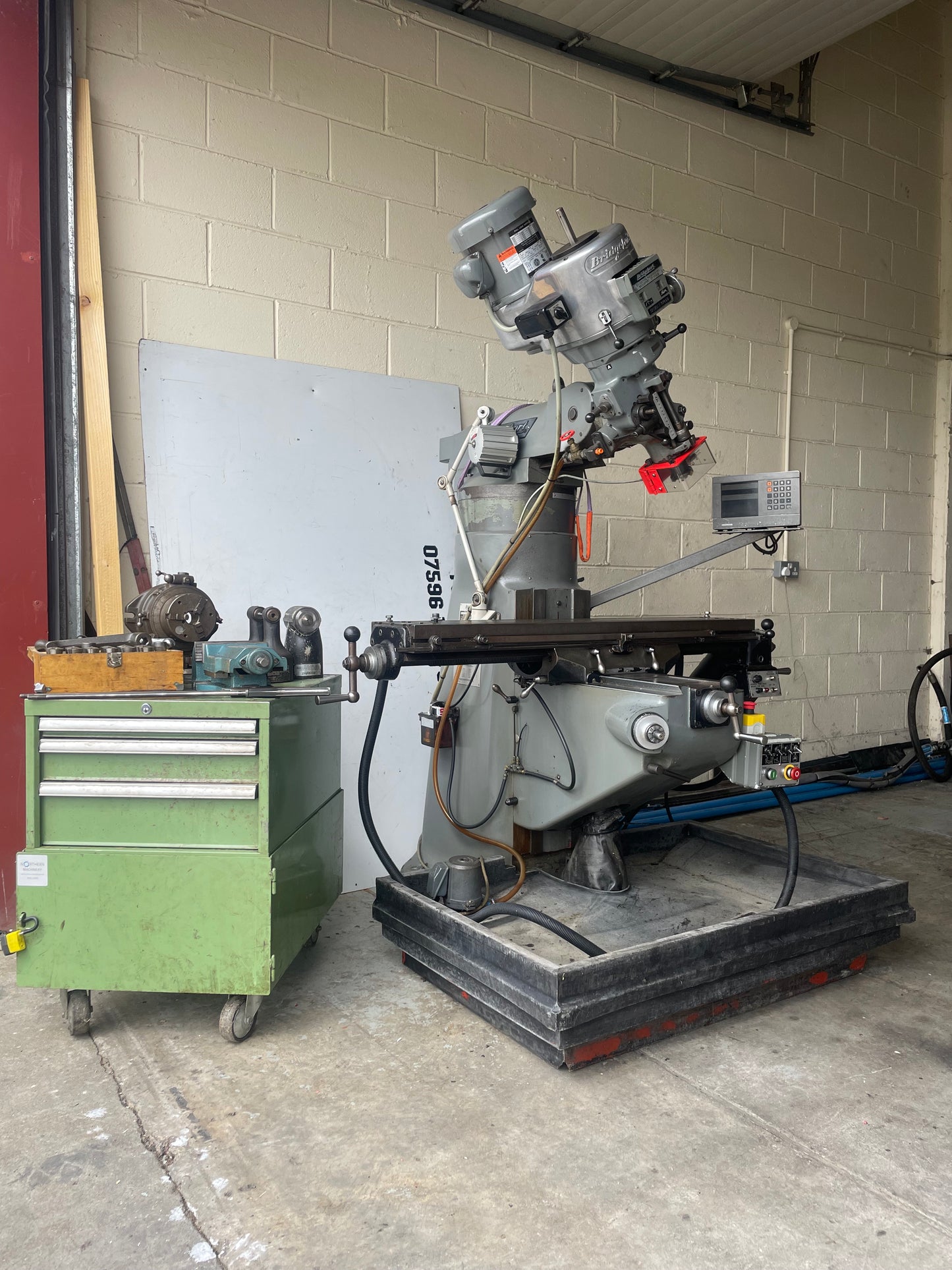 Bridgeport Milling Machine Vari speed head, 48" table. LOTS OF EXTRAS